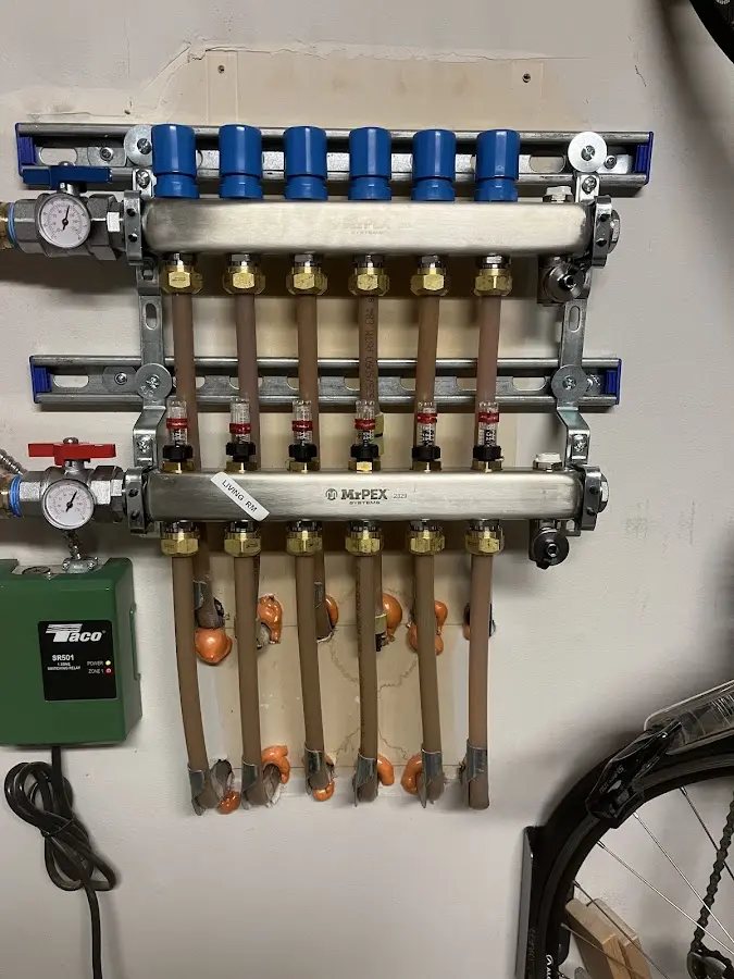 Plumber performing Water Heater Repair at a residential property in Arlington Heights